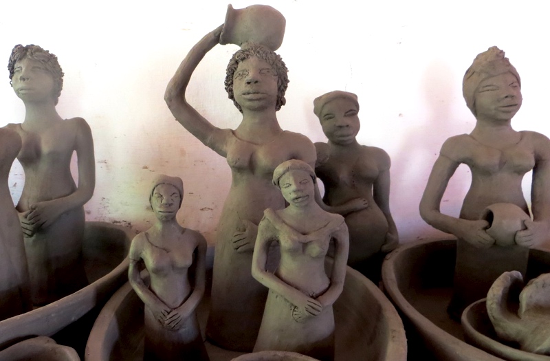 Clay figurines drying